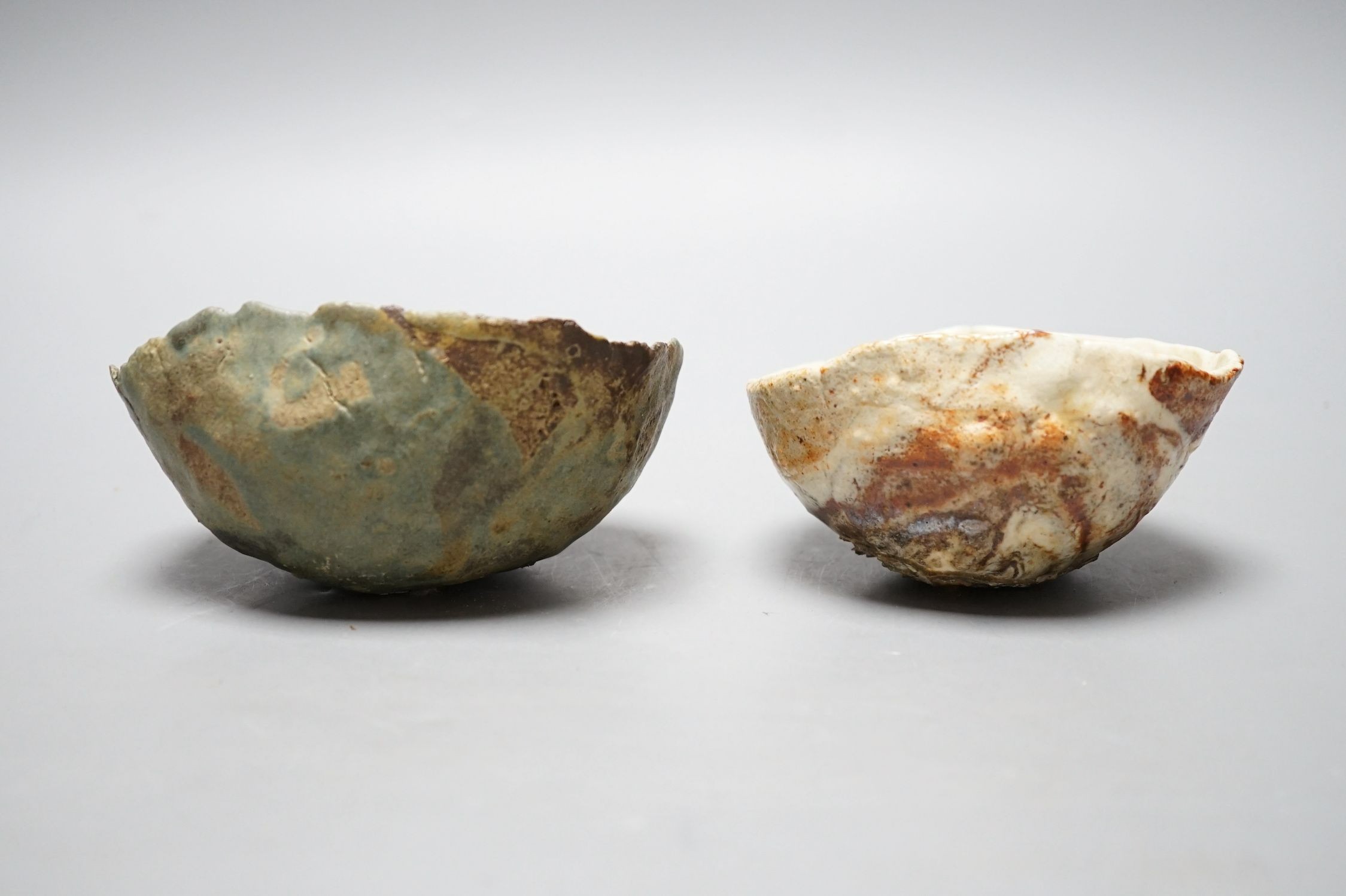 Ewen Henderson (1934-2000), two hand-built mixed laminated clay dishes, largest 12.5cm wide